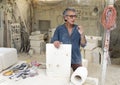 World-renowned limestone artist Renzo Buttazo lecturing to tour group in his studio