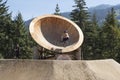 A bike rider at Crankworx Whistler 2022 practices his jumps