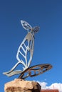 The world\'s largest butterfly sculpture, Las Mariposas, created by Robert Romero against a blue sky