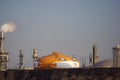 World`s largest Halloween jack o`lantern, Smilin` Jack, painted on a refinery storage tank in Wilmington, California , wears a fac