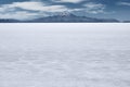 The world's largest salt flat and dormant volcano Tunupa at the far background