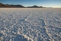 The world`s largest salt flat, Salar de Uyuni in Bolivia, photographed at sunrise Royalty Free Stock Photo