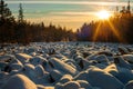 the world\'s largest stone river in the snow in the rays of the setting sun Royalty Free Stock Photo