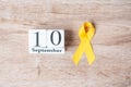 World Suicide prevention day 10 September, Yellow Ribbon for supporting people living and illness. Stop and Save Suicidal