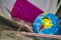 World surrounded by plastic trash. Plastic pollution concept Royalty Free Stock Photo