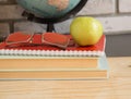 World teachers ' Day in school. Still life with books, globe, Apple, glasses Royalty Free Stock Photo