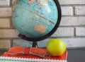 World teachers ' Day in school. Still life with books, globe, Apple, glasses Royalty Free Stock Photo
