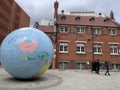 The World Turned Upside Down, is a globe, which stands inverted on the north pole, outside London School of Economics Royalty Free Stock Photo