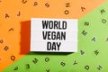 World Vegan Day words in light box on bright flat lay background Royalty Free Stock Photo