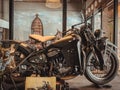 World war II Army motorcycle display in a glass cabinet in a coffee shop. -Image, stock photo