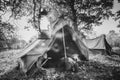 World War II German Wehrmacht Infantry Tent In Forest Camp. WWII WW2 German Ammunition. Photo In Black And White Colors