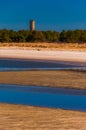 World War II Lookout tower and beach at Cape Henlopen State Park, DE. Royalty Free Stock Photo