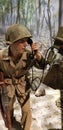 World War II Marine Corps Rifleman behind a tank