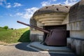 World War Two German artillery remnant at Longues-sur-Mer, Atlantic Wall fortification, Normandy, France Royalty Free Stock Photo