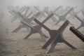 World war two tank traps in fog Royalty Free Stock Photo