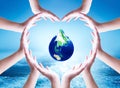 World water day concept: Collaborative human hands grouped in heart shape Royalty Free Stock Photo