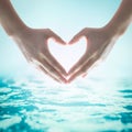 World water day concept with hands in love heart shape concept Royalty Free Stock Photo