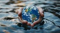 World water day, planet earth in water in the hands