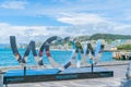 World of Wearable Art iconic shiny silver sign on city waterfront