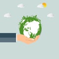 The world in your hands ecology concept.Green cities help the world with eco-friendly concept idea.with globe and tree background