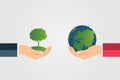 The world in your hands ecology concept.Green cities help the world with eco-friendly concept idea.with globe and tree background Royalty Free Stock Photo