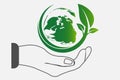 The world in your hands ecology concept.Green cities help the world with eco-friendly concept idea.with globe and tree background. Royalty Free Stock Photo