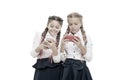 Worldwide net. Internet resource has hazards for kids. Girls school uniform surfing internet. Schoolgirls use mobile