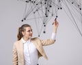 Worldwide network or wireless internet connection futuristic concept. Woman working with linked dots. Royalty Free Stock Photo