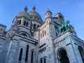 Worm`s eye view of Sacre Coeur basilica, toward the equestrian Saint Louis statue and the dome, Paris, France Royalty Free Stock Photo