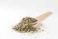 wormwood herb or in latin Absinthii herba herb in wooden spoon isolated on white background. medicinal healing herbs. Royalty Free Stock Photo