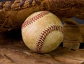 Worn baseball and old glove Royalty Free Stock Photo