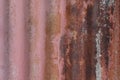 worn corrugated red metal plate background Royalty Free Stock Photo