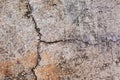 Worn and cracked asphalt with big cracks. Old road concrete texture with cracks. Cement cracked background Royalty Free Stock Photo