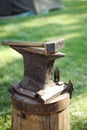 Worn iron anvil and hammer Royalty Free Stock Photo