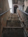 Worn iron stairs that have rusted with time Royalty Free Stock Photo