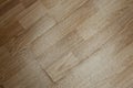 Worn laminate parquet surface with wooden pattern, abstract repair backdrop Royalty Free Stock Photo