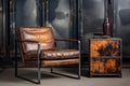 a worn leather armchair beside a steel side table