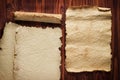 Ancient paper, scrolls on a wooden table as background Royalty Free Stock Photo