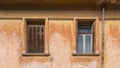 Old fashioned wooden windows, on grunge wall background Royalty Free Stock Photo