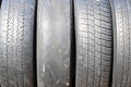 Worn out bald old car tire Royalty Free Stock Photo