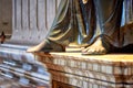 Worn out feet of the Statue of St. Peter in St. Peter's Basilica Royalty Free Stock Photo