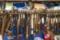 Worn-out hammers hanging on rebar