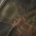 Worn-out leather texture showing significant deterioration Royalty Free Stock Photo