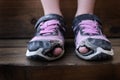 Worn Out Old Shoes with Holes in Toes Homeless Child Royalty Free Stock Photo