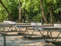 Worn out ping pong tables in Herestrau park, Bucharest.. Outdoor metal tables for tennis Royalty Free Stock Photo