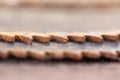 Worn out rusty circular saw blades, macro abstract defocused background, copy space, teeth detail