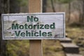 Worn out sign indicating No Motorized Vehicles Royalty Free Stock Photo