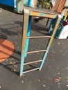 Worn paintwork and rusty steel detail on Ladder