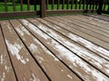 Worn peeling deck surface needing new stain Royalty Free Stock Photo