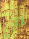 Worn rusty metal texture background. Green paint flaking and cracking texture